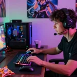 Gamer immersed in a thrilling hentai game experience with vibrant RGB lighting and gaming gear.